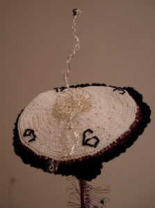 Lisa Daehlin_Windmills of your mind_knit crochet flower_Harlem Needle Arts Blossom of Fiber 2011_clock face side full with hands